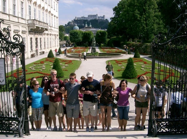 Reenacting a scene from the Sound of Music at Mirabell Gardens in Salzburg