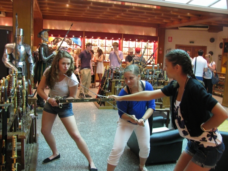 Checking out the swords at a store in Toledo